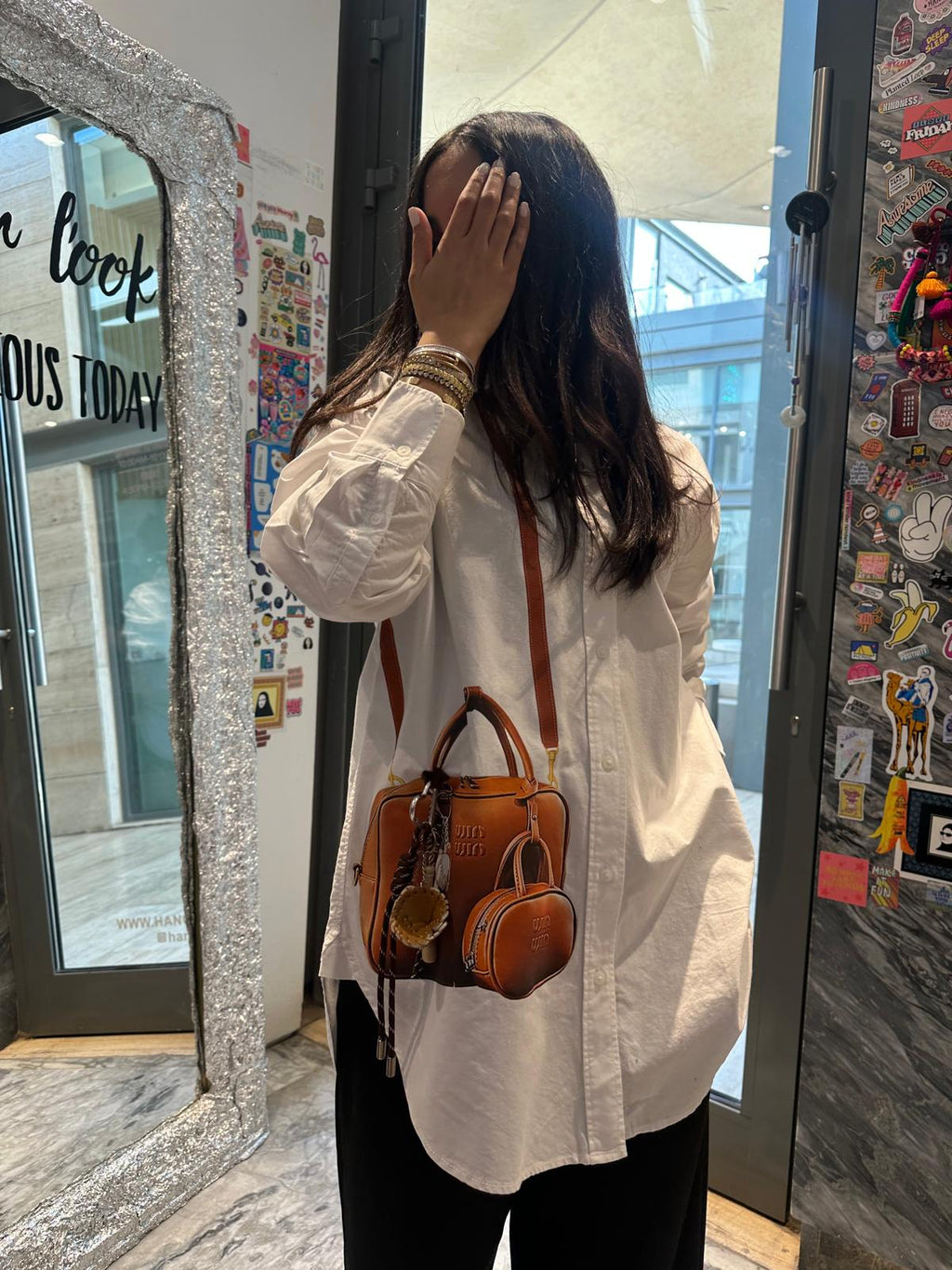 Fancy white shirt with baseball charm