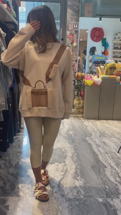 Fur bag on a sweater